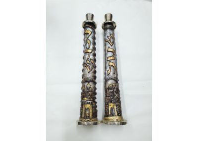 An oryx horn candle sticks engraved with jerusalem view